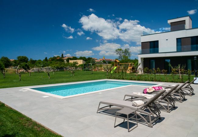 Villa in Vodnjan - Villa Arestea near Pula with heated pool, sea view, wellness & playground Villa in Vodnjan - Villa Arestea near Pula with heated pool, sea view, wellness & playground