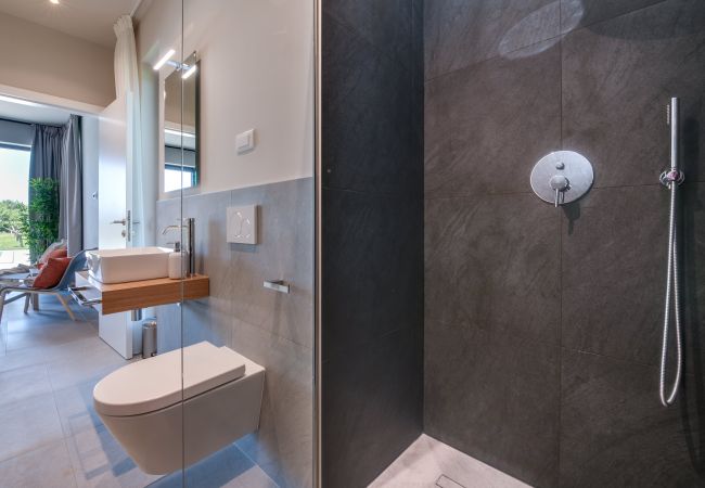 Villa in Vodnjan - Villa Arestea near Pula with heated pool, sea view, wellness & playground Villa in Vodnjan - Villa Arestea near Pula with heated pool, sea view, wellness & playground