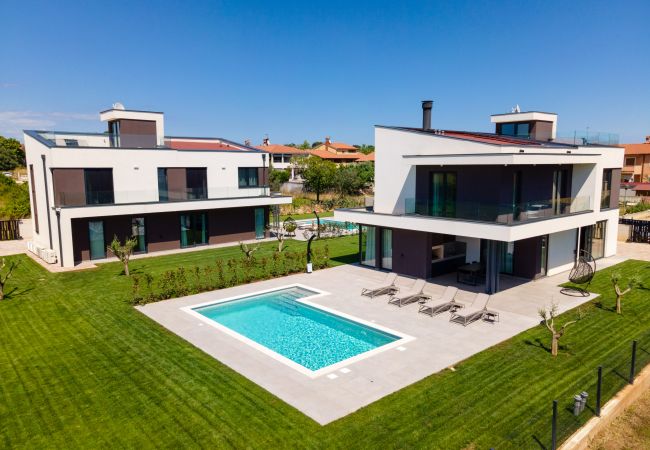 Villa in Vodnjan - Villa Arestea near Pula with heated pool, sea view, wellness & playground Villa in Vodnjan - Villa Arestea near Pula with heated pool, sea view, wellness & playground