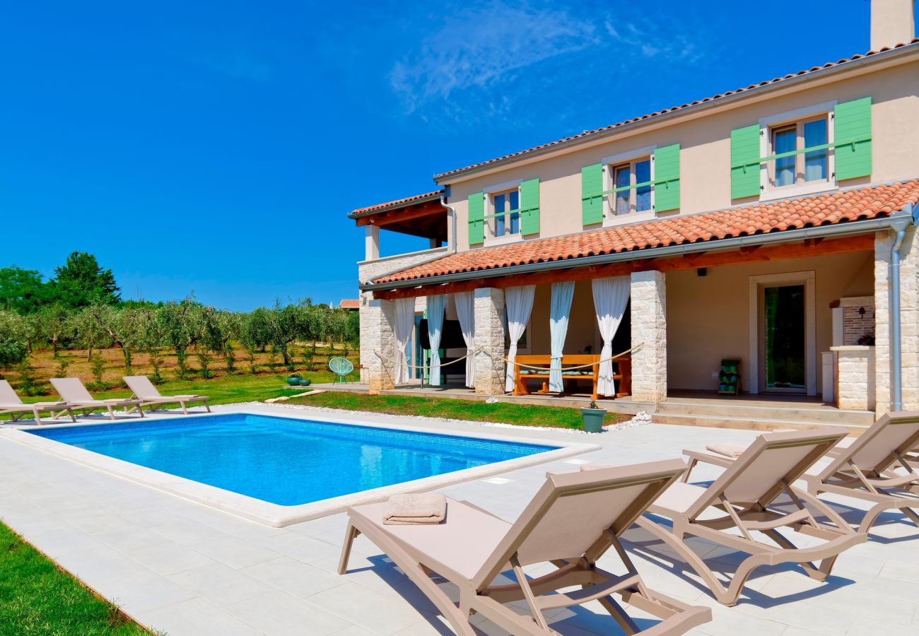 Villa in Srebrnići - Villa Stella Polaris for 8 persons in Central Istria with private pool, sea view, large garden & kids playground