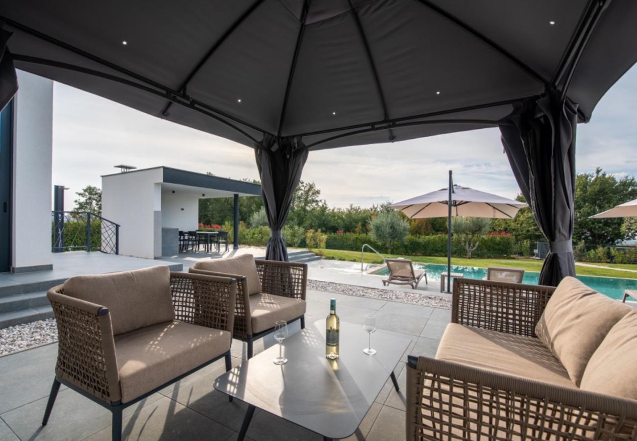 Villa in Deklici - Villa Nura for 8 persons near Poreč with 36 m2 heated pool, with sauna & sea view 