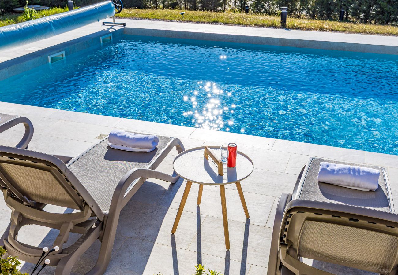 Villa in Brtonigla - Villa Miracle for 5 persons near Novigrad with wellness area, 50 m2 heated pool, sea view & kids playground