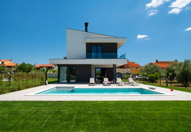 Villa a Vodnjan - Villa Arestea near Pula with heated pool, sea view, wellness & playground Villa a Vodnjan - Villa Arestea near Pula with heated pool, sea view, wellness & playground