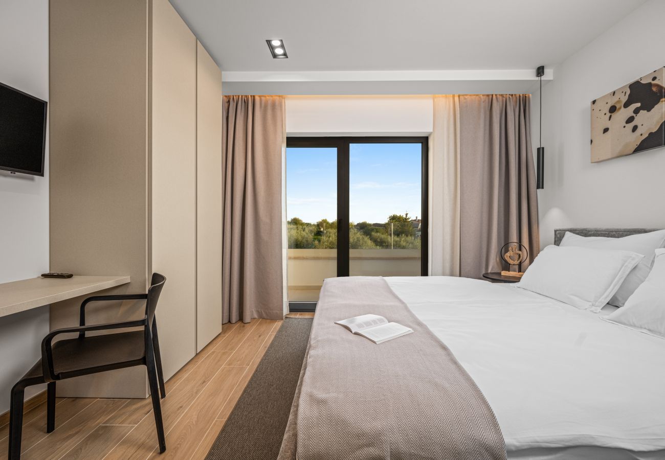 Villa a Anžici - Villa Asmoa for 8 people near Poreč with 45 m2 heated pool, wellness & sea view