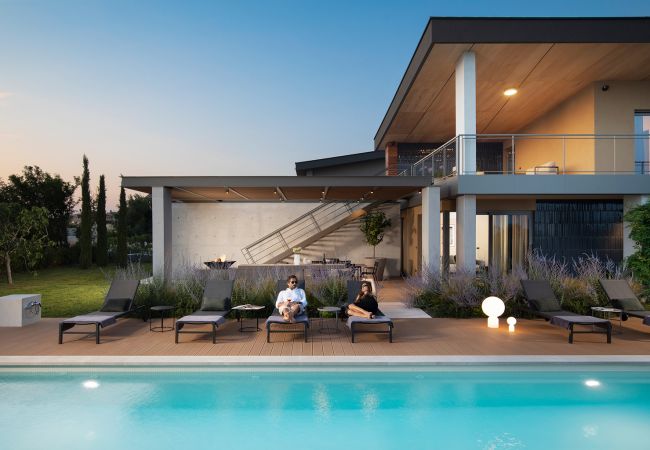 Villa a Vodnjan - Luxury Villa Puerto de Paz for 8 people near Fažana with 60 m2 private heated pool, sauna, mini-golf & sea view  Villa a Vodnjan - Luxury Villa Puerto de Paz for 8 people near Fažana with 60 m2 private heated pool, sauna, mini-golf & sea view