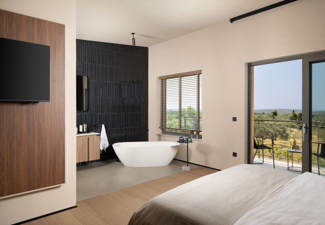 Villa a Vodnjan - Luxury Villa Puerto de Paz for 8 people near Fažana with 60 m2 private heated pool, sauna, mini-golf & sea view  Villa a Vodnjan - Luxury Villa Puerto de Paz for 8 people near Fažana with 60 m2 private heated pool, sauna, mini-golf & sea view