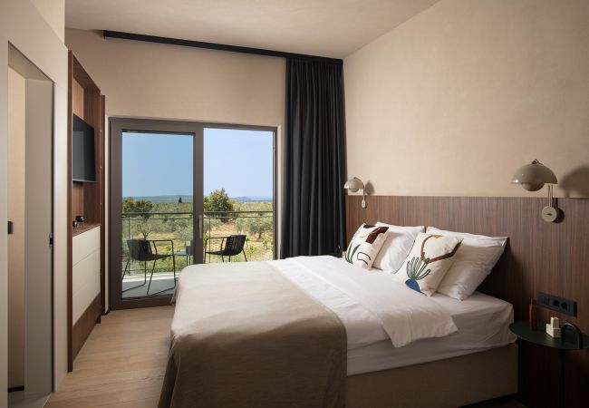 Villa a Vodnjan - Luxury Villa Puerto de Paz for 8 people near Fažana with 60 m2 private heated pool, sauna, mini-golf & sea view  Villa a Vodnjan - Luxury Villa Puerto de Paz for 8 people near Fažana with 60 m2 private heated pool, sauna, mini-golf & sea view