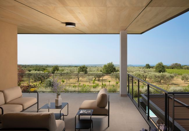 Villa a Vodnjan - Luxury Villa Puerto de Paz for 8 people near Fažana with 60 m2 private heated pool, sauna, mini-golf & sea view  Villa a Vodnjan - Luxury Villa Puerto de Paz for 8 people near Fažana with 60 m2 private heated pool, sauna, mini-golf & sea view