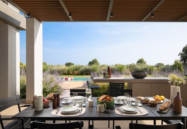 Villa a Vodnjan - Luxury Villa Puerto de Paz for 8 people near Fažana with 60 m2 private heated pool, sauna, mini-golf & sea view  Villa a Vodnjan - Luxury Villa Puerto de Paz for 8 people near Fažana with 60 m2 private heated pool, sauna, mini-golf & sea view