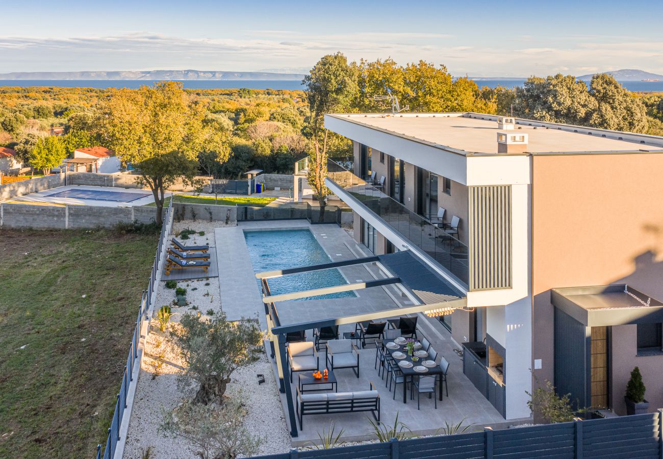 Villa a Ližnjan - Casa Carla near Medulin for 10 persons with 48 m2 heated pool and beautiful sea view - pet friendly