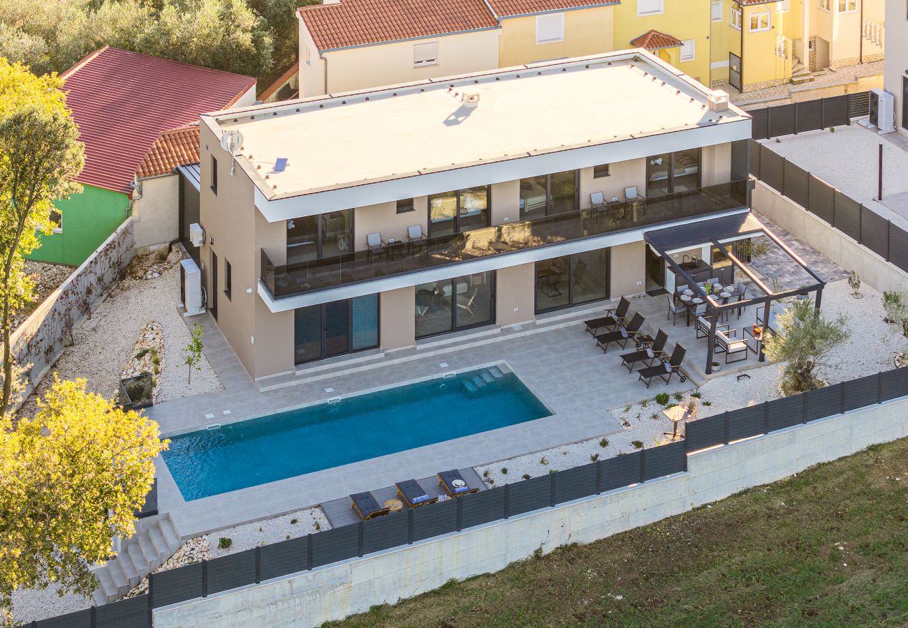Villa a Ližnjan - Casa Carla near Medulin for 10 persons with 48 m2 heated pool and beautiful sea view - pet friendly