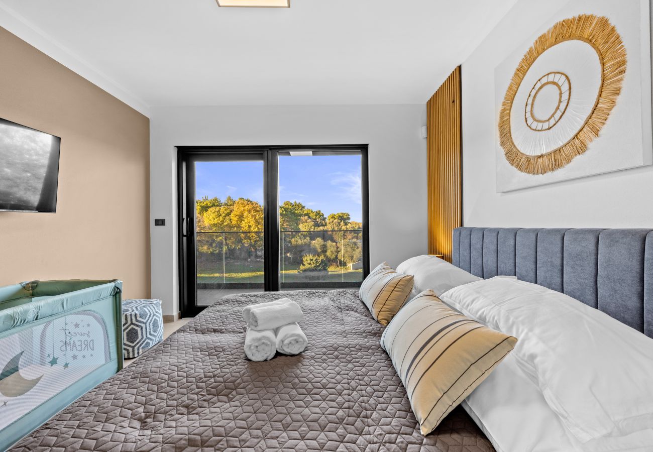 Villa a Ližnjan - Casa Carla near Medulin for 10 persons with 48 m2 heated pool and beautiful sea view - pet friendly