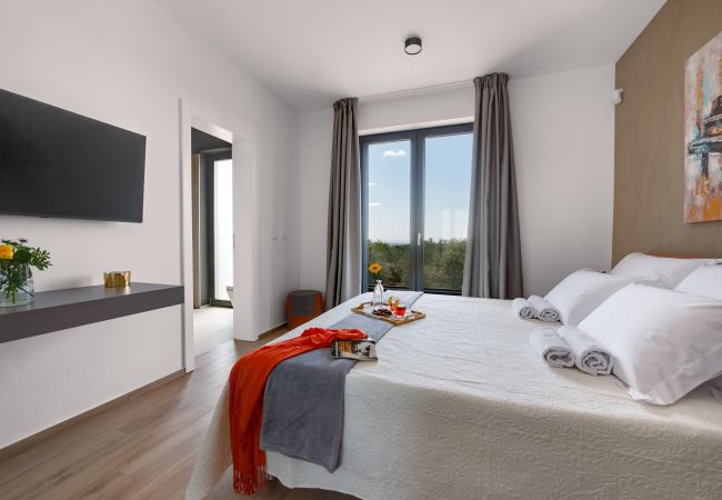 Villa in Vodnjan - Villa Arestea near Pula with sea view, wellness & playground Villa in Vodnjan - Villa Arestea near Pula with sea view, wellness & playground