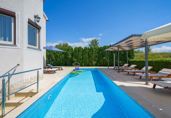 Villa in Micetici - Villa Eufemia near Poreč with large garden and outdoor playground for kids Villa in Micetici - Villa Eufemia near Poreč with large garden and outdoor playground for kids