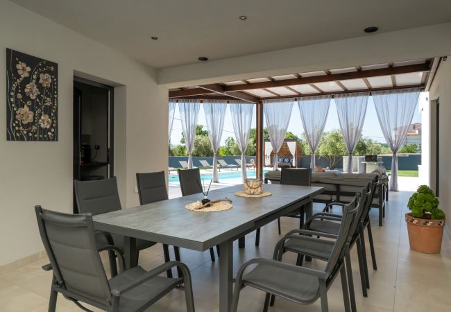 Villa in Krnica - Villa Posidonia near Pula with sea view and surrounded by olive trees Villa in Krnica - Villa Posidonia near Pula with sea view and surrounded by olive trees