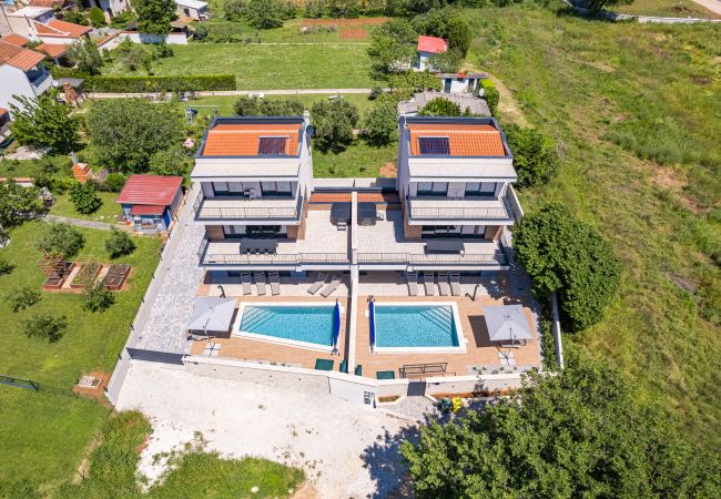 Villa in Medulin - Villa Bay II near Medulin for 9 people with heated pool - playground & whirpool only 100 meters from the beach Villa in Medulin - Villa Bay II near Medulin for 9 people with heated pool - playground & whirpool only 100 meters from the beach