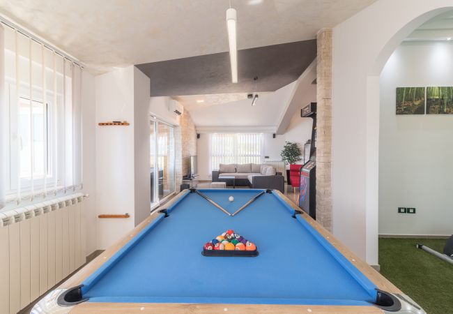 Villa in Valtura - Villa Istra Kamen for kids & families near Pula for 18 people with sport activities, wellness & 67 m2 heated private pool Villa in Valtura - Villa Istra Kamen for kids & families near Pula for 18 people with sport activities, wellness & 67 m2 heated private pool