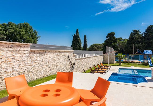 Villa in Valtura - Villa Istra Kamen for kids & families near Pula for 18 people with sport activities, wellness & 67 m2 heated private pool Villa in Valtura - Villa Istra Kamen for kids & families near Pula for 18 people with sport activities, wellness & 67 m2 heated private pool