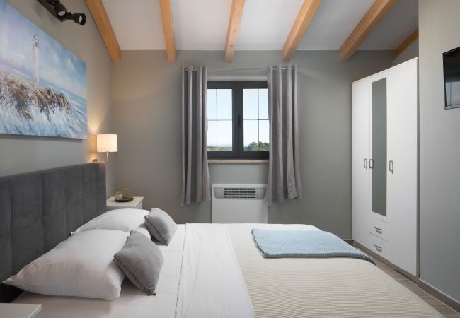 Villa in Divšici - Villa Korat for 8 people in Central Istria with 49 m2 pool, sauna & children playground Villa in Divšici - Villa Korat for 8 people in Central Istria with 49 m2 pool, sauna & children playground