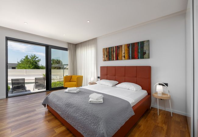 Villa in Varvari - Villa Anni for 10 people in Porec with heated pool, sea view & kids room and playground Villa in Varvari - Villa Anni for 10 people in Porec with heated pool, sea view & kids room and playground