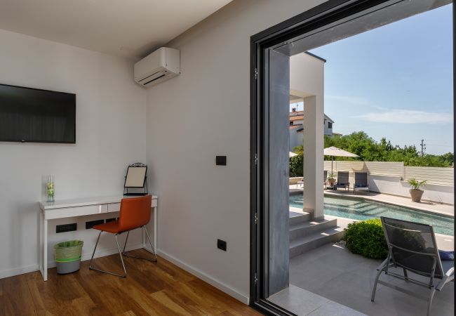 Villa in Varvari - Villa Anni for 10 people in Porec with heated pool, sea view & kids room and playground Villa in Varvari - Villa Anni for 10 people in Porec with heated pool, sea view & kids room and playground