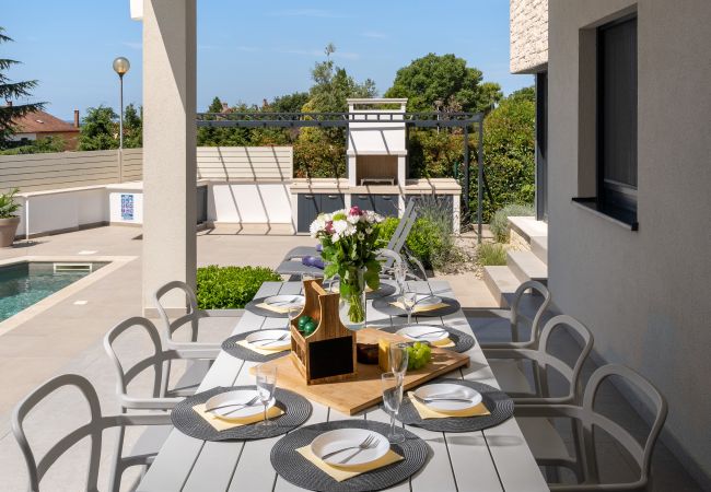 Villa in Varvari - Villa Anni for 10 people in Porec with heated pool, sea view & kids room and playground Villa in Varvari - Villa Anni for 10 people in Porec with heated pool, sea view & kids room and playground