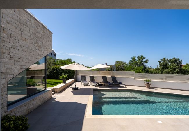 Villa in Varvari - Villa Anni for 10 people in Porec with heated pool, sea view & kids room and playground Villa in Varvari - Villa Anni for 10 people in Porec with heated pool, sea view & kids room and playground