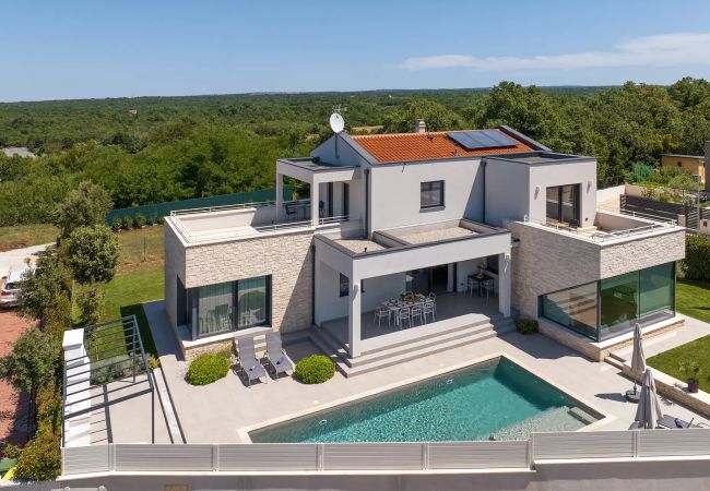 Villa in Varvari - Villa Anni for 10 people in Porec with heated pool, sea view & kids room and playground Villa in Varvari - Villa Anni for 10 people in Porec with heated pool, sea view & kids room and playground