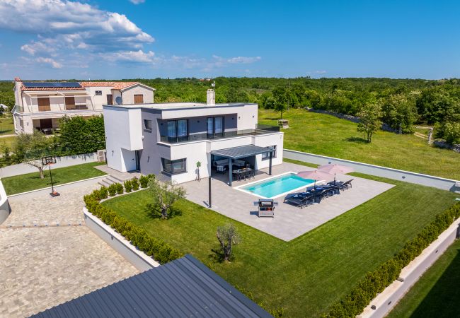 Villa in Juršici - Villa Ana Škicini for 10 people with heated pool, kids activities and sea view near Novigrad Villa in Juršici - Villa Ana Škicini for 10 people with heated pool, kids activities and sea view near Novigrad