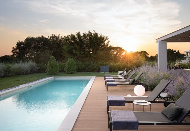 Villa in Vodnjan - Luxury Villa Puerto de Paz for 8 people near Fažana with 60 m2 private heated pool, sauna, mini-golf & sea view  Villa in Vodnjan - Luxury Villa Puerto de Paz for 8 people near Fažana with 60 m2 private heated pool, sauna, mini-golf & sea view