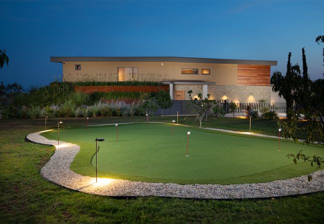 Villa in Vodnjan - Luxury Villa Puerto de Paz for 8 people near Fažana with 60 m2 private heated pool, sauna, mini-golf & sea view  Villa in Vodnjan - Luxury Villa Puerto de Paz for 8 people near Fažana with 60 m2 private heated pool, sauna, mini-golf & sea view