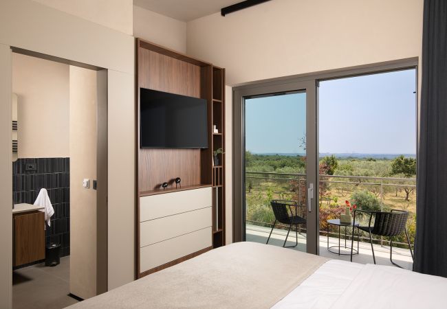 Villa in Vodnjan - Luxury Villa Puerto de Paz for 8 people near Fažana with 60 m2 private heated pool, sauna, mini-golf & sea view  Villa in Vodnjan - Luxury Villa Puerto de Paz for 8 people near Fažana with 60 m2 private heated pool, sauna, mini-golf & sea view