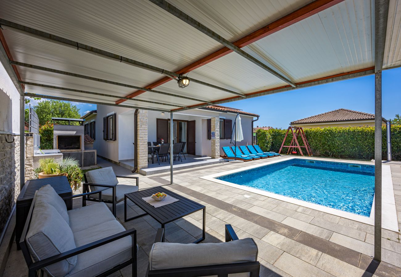 Вилла на Marcana - Holiday House Gortan for 7 people near Pula with children playground and heated pool