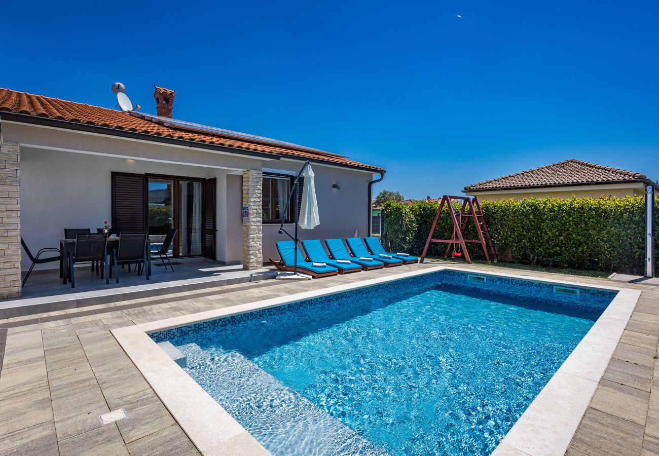 Вилла на Marcana - Holiday House Gortan for 7 people near Pula with children playground and heated pool