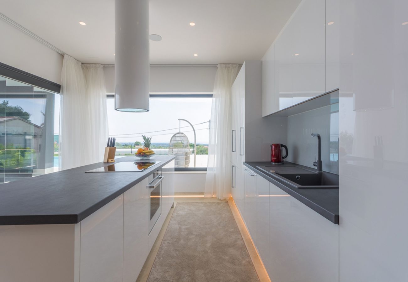 Вилла на Valentici - Villa Gabrijela for 10 people near Novigrad with 66 m2 heated pool and sea view