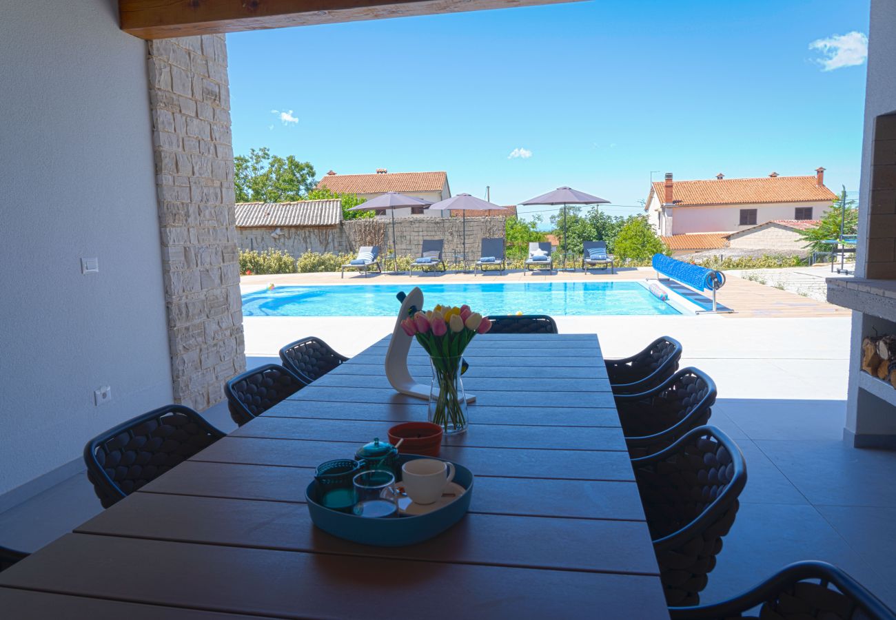 Вилла на Rapavel - Villa Blue Moon for 9 persons near Poreč with 42 m2 heated pool, wellness, kids playground & sea view