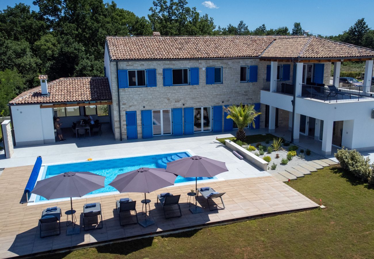 Вилла на Rapavel - Villa Blue Moon for 9 persons near Poreč with 42 m2 heated pool, wellness, kids playground & sea view