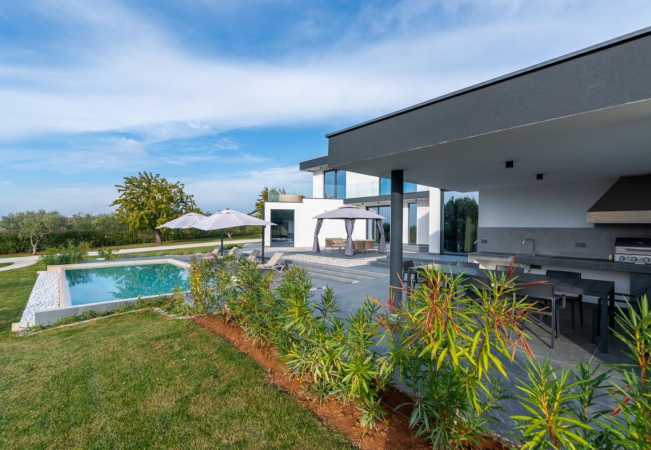 Вилла на Deklici - Villa Nura for 8 persons near Poreč with 36 m2 heated pool, with sauna & sea view 