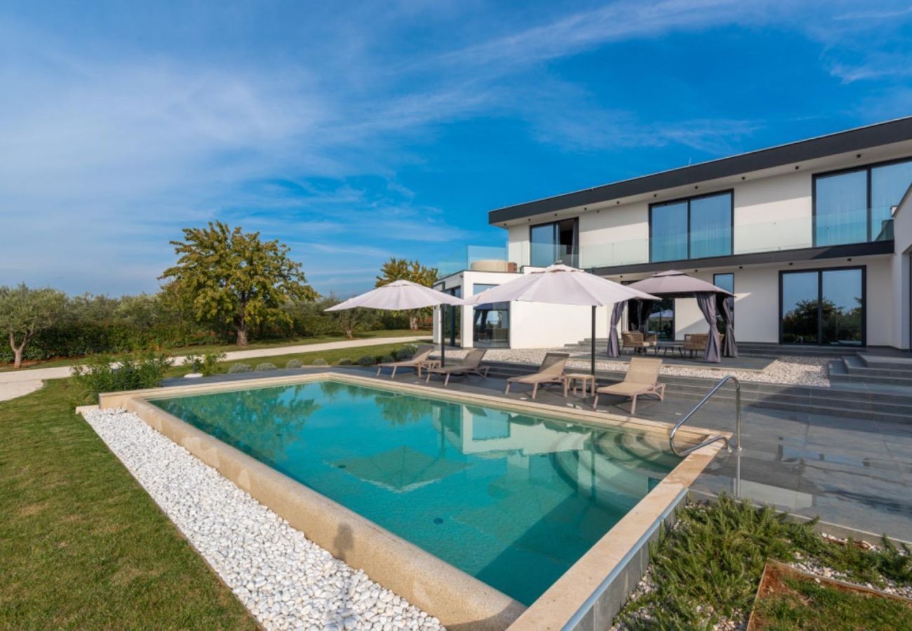 Вилла на Deklici - Villa Nura for 8 persons near Poreč with 36 m2 heated pool, with sauna & sea view 