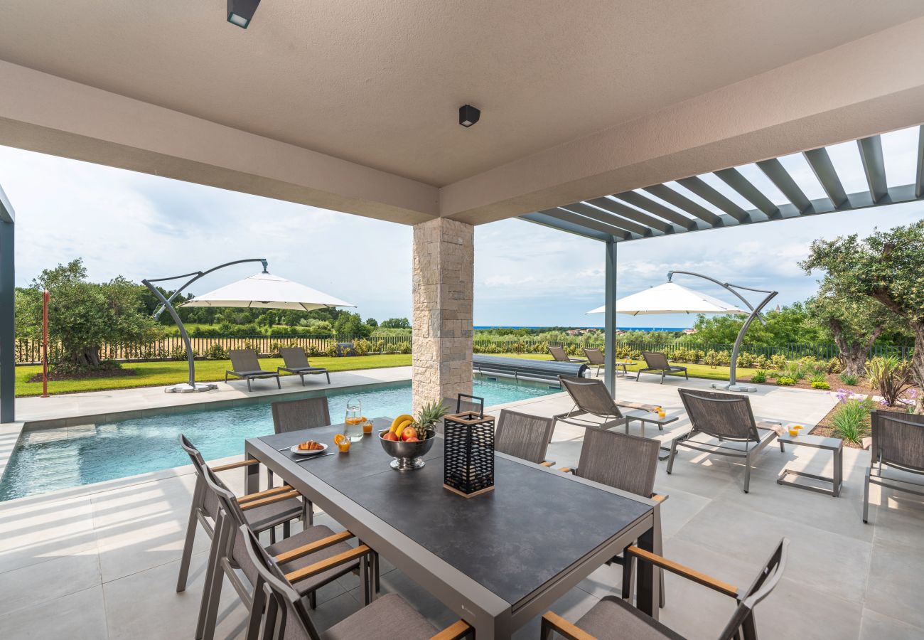 Вилла на Višnjan - Villa Visignano near Poreč for 8 people with 49 m2 heated pool, wellness & sea view