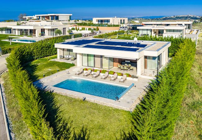 Вилла на Brtonigla - Villa Miracle for 5 persons near Novigrad with wellness area, 50 m2 heated pool, sea view & kids playground