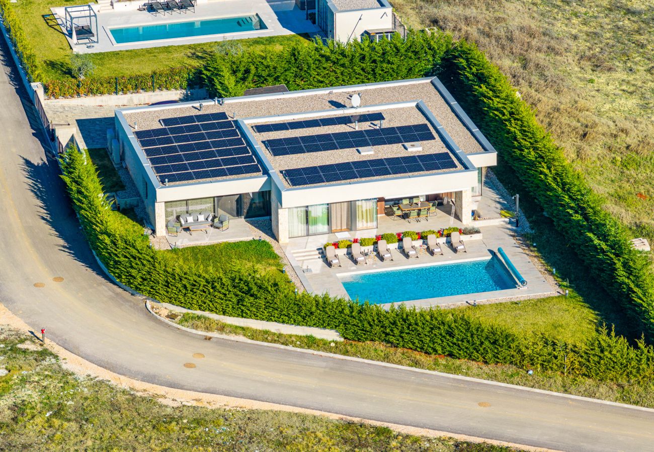 Вилла на Brtonigla - Villa Miracle for 5 persons near Novigrad with wellness area, 50 m2 heated pool, sea view & kids playground