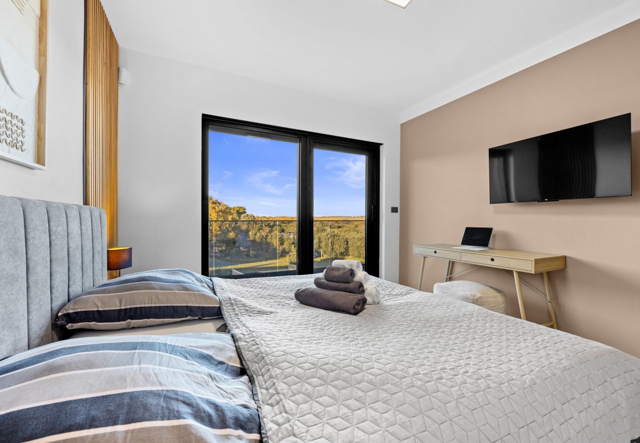 Вилла на Ližnjan - Casa Carla near Medulin for 10 persons with 48 m2 heated pool and beautiful sea view - pet friendly