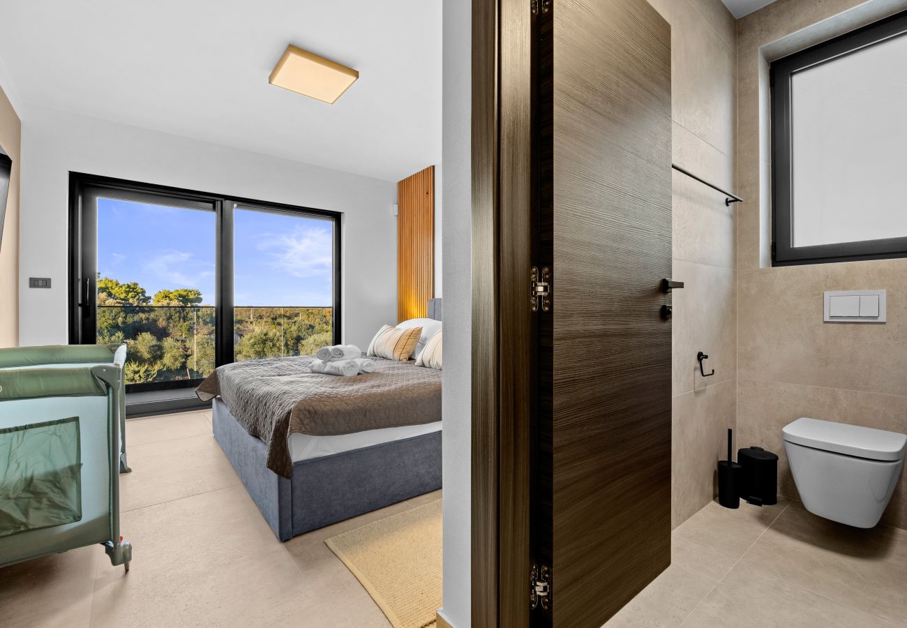 Вилла на Ližnjan - Casa Carla near Medulin for 10 persons with 48 m2 heated pool and beautiful sea view - pet friendly