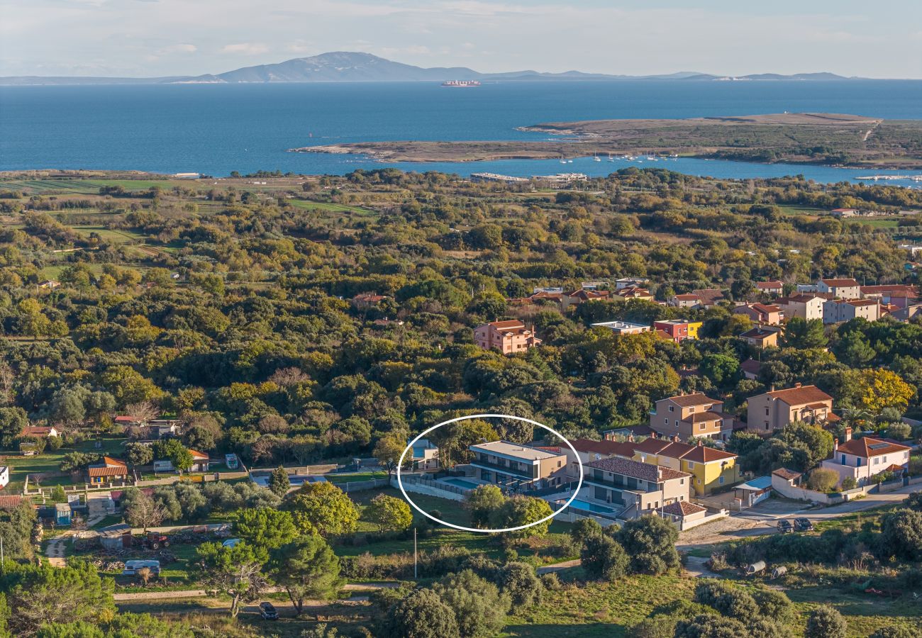 Вилла на Ližnjan - Casa Carla near Medulin for 10 persons with 48 m2 heated pool and beautiful sea view - pet friendly