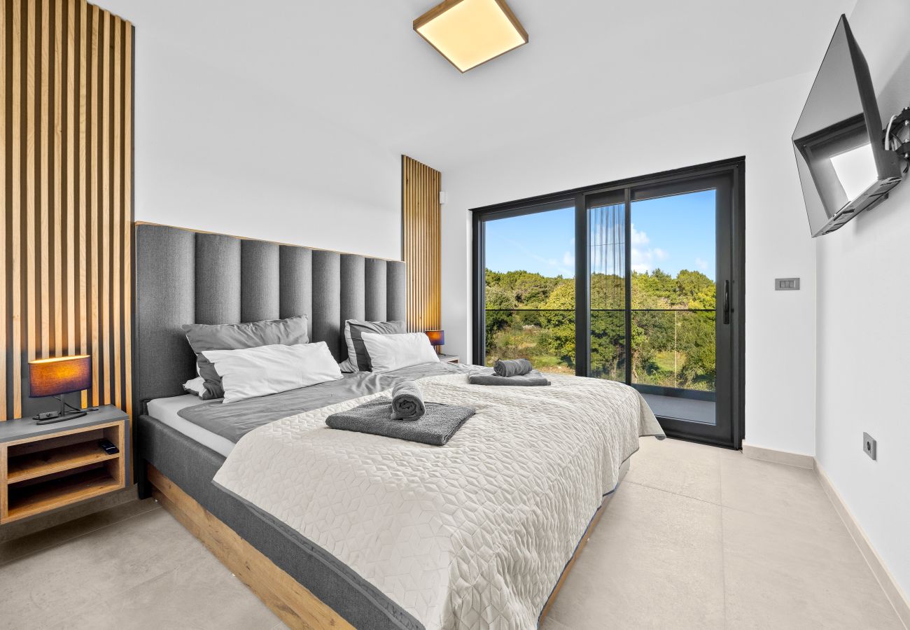 Вилла на Ližnjan - Villa Malena near Medulin for 8 persons with 51 m2 heated pool, wellness & beautiful sea view