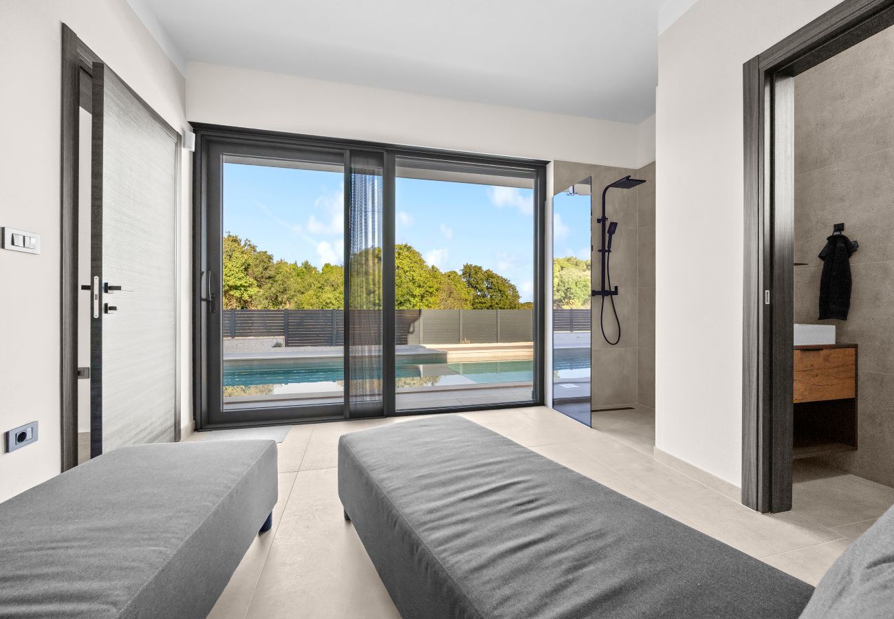 Вилла на Ližnjan - Villa Malena near Medulin for 8 persons with 51 m2 heated pool, wellness & beautiful sea view